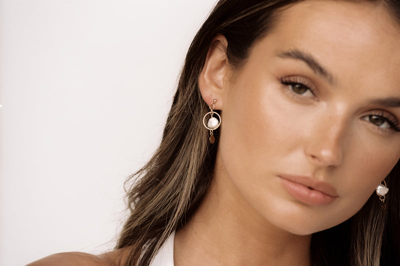 Sade medium hoops in gold and Alice gold huggies featuring opal – V By  Laura Vann